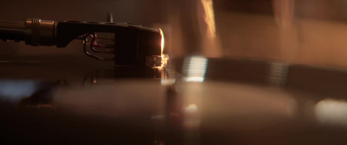 A needle on a record on a turn table
