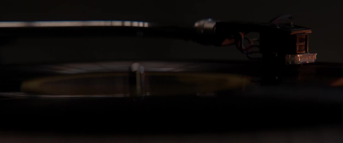 A record spins on a turntable