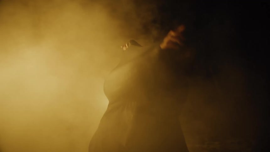 A person dancing with a mesh over them