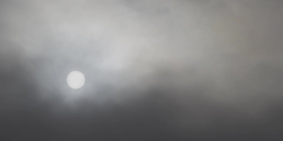 The sun peeks out from behind moving cloud cover