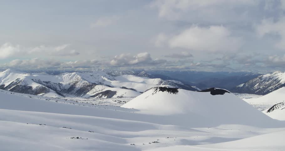 A snow covered volcanic landscape