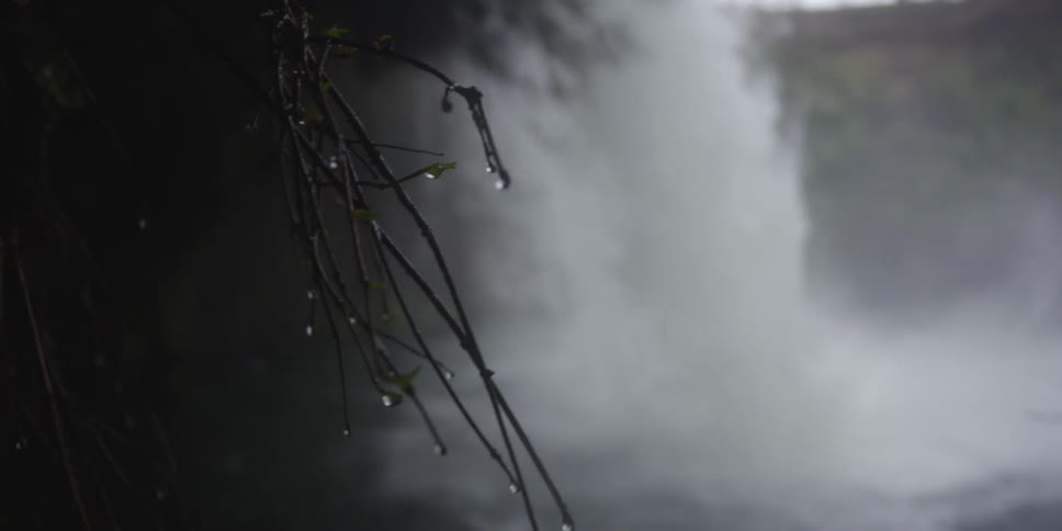 Waterfall splashes into the water below