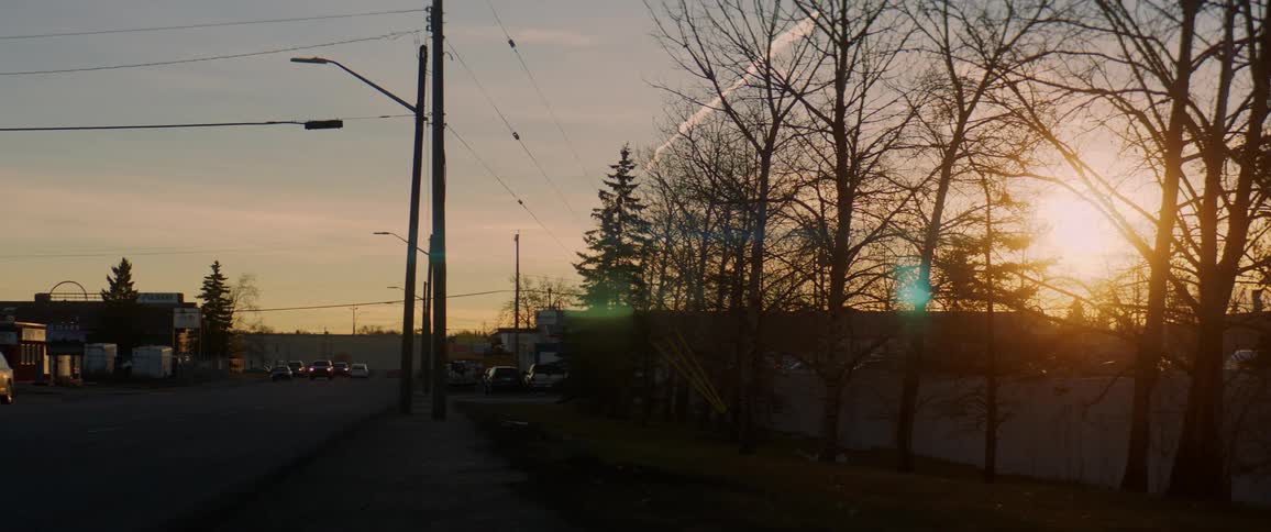 Cars move through a small town
