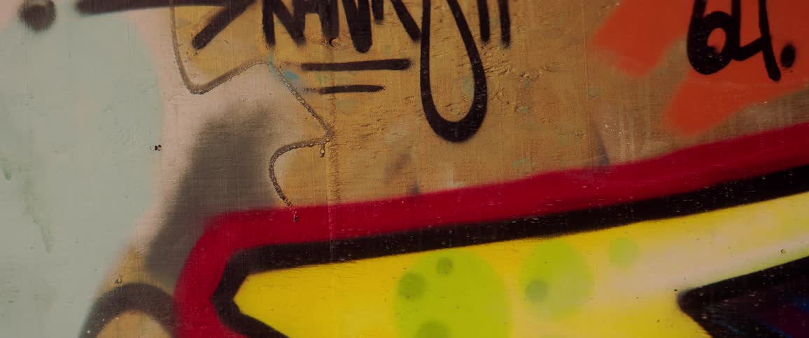 Colorful graffiti spray painted on a wall