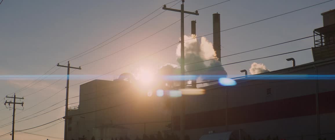 Smoke billowing out of a factory