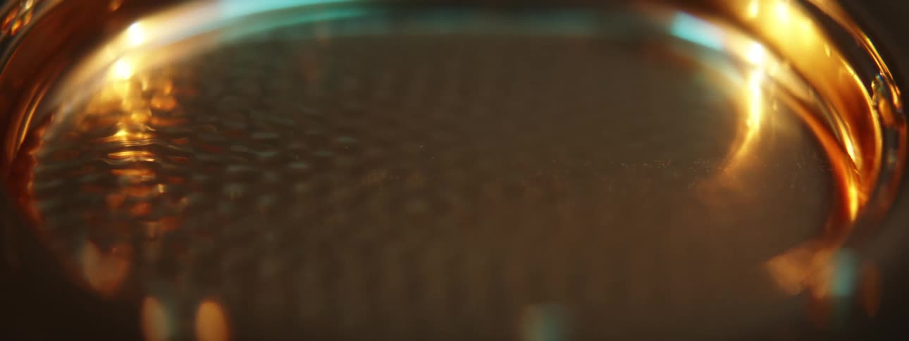 Water ripples across surface in bucket