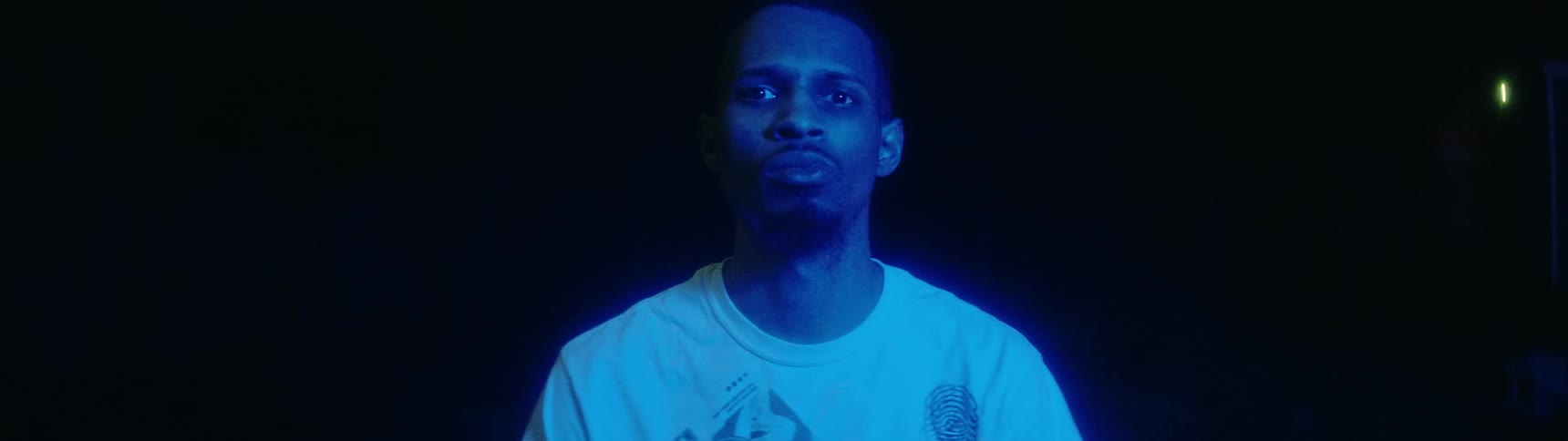 Alight flashes above a man
