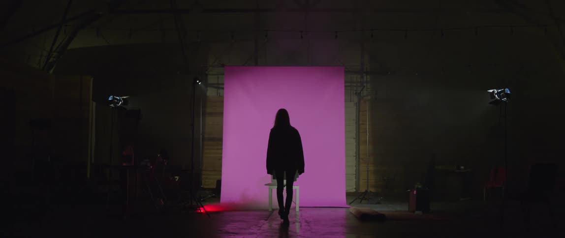 A model walks on to a set