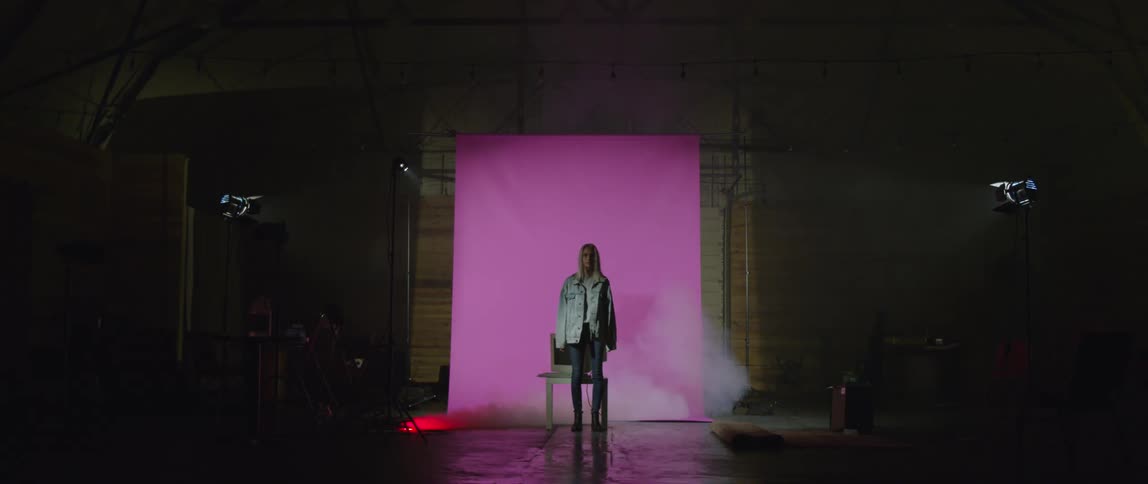 A model turns and looks at the camera