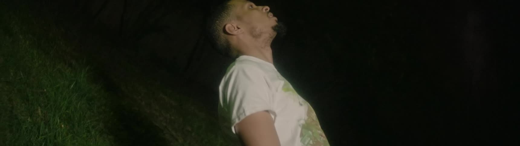 Man falling to ground with strobe light effect