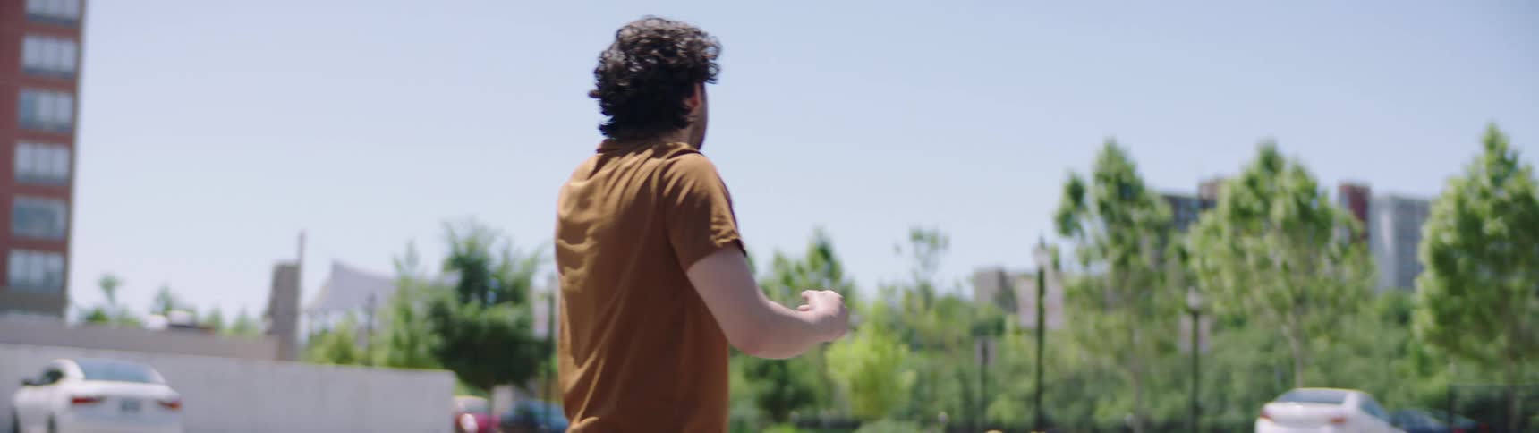 A man cries as the car he tries to make stop drives away from home