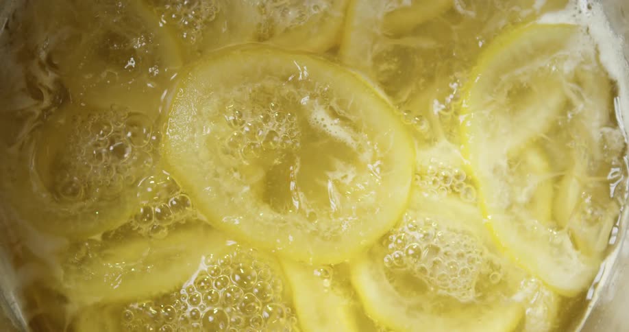 Lemons boiling in water