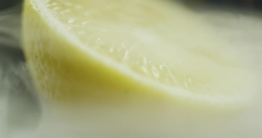 Mist covering a lemon cut in half