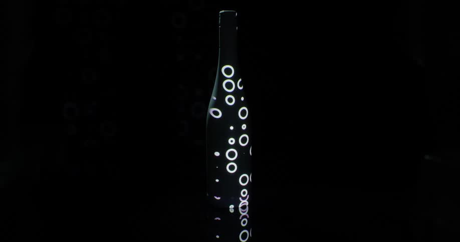 Lights light up and disappear on a bottle