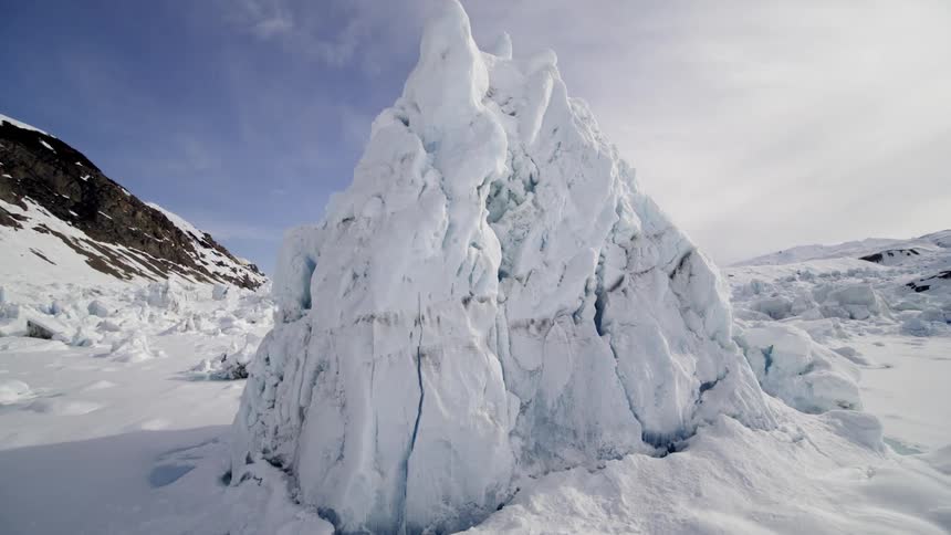 Ice formation snow covered plains surrounded by mountains