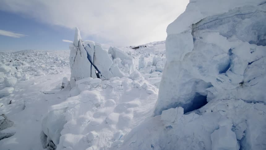 Glacial landscape under a blue sky