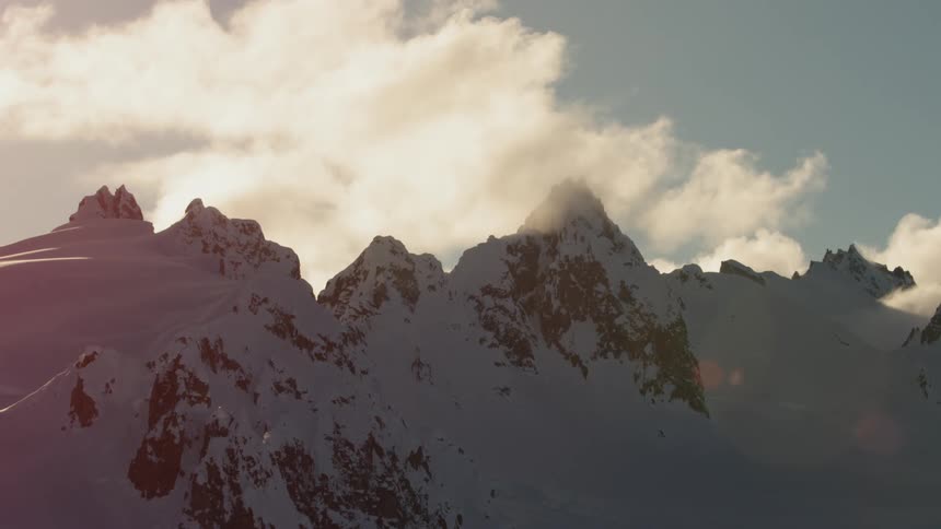 A mountain range covered in winter snow