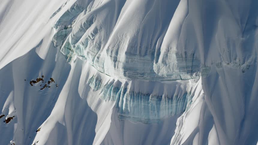Snow is covering the mountains in the arctic