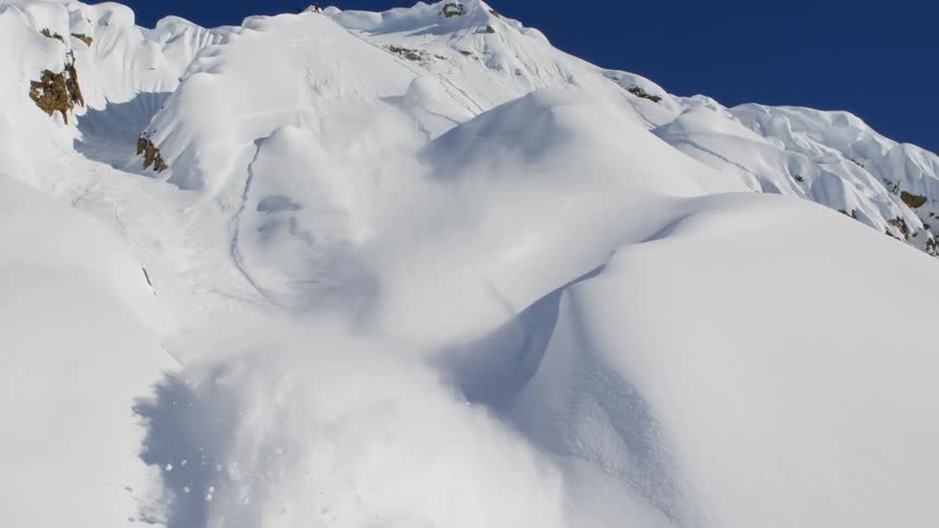 Snow is falling from a mountain
