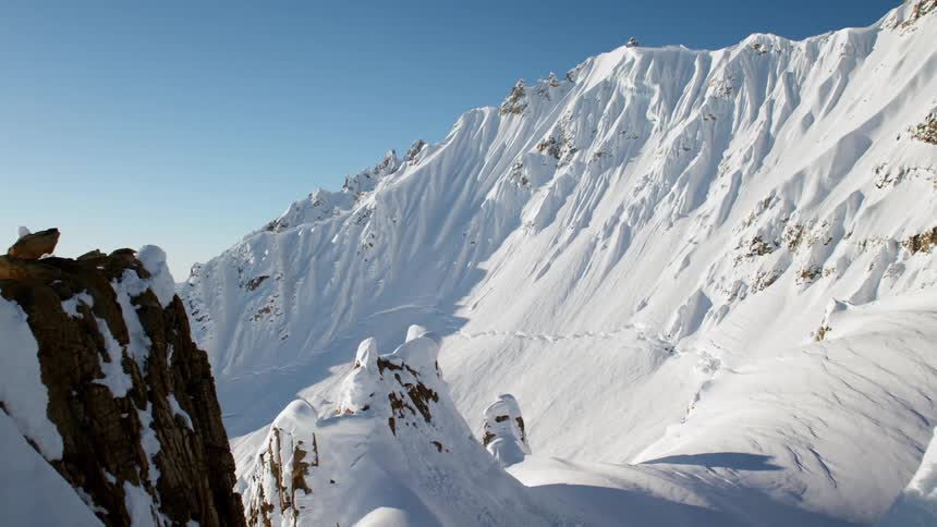 Snow capped mountains on a sunny day