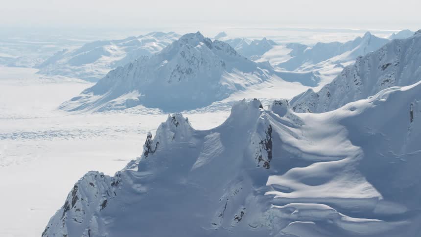 Snow covered rugged mountain range
