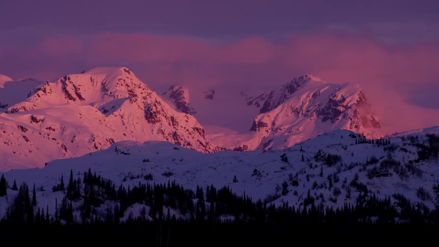A mountain range covered in snow