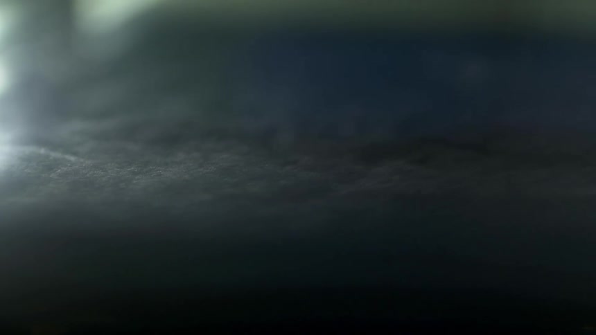The light slowly shines over the dark material