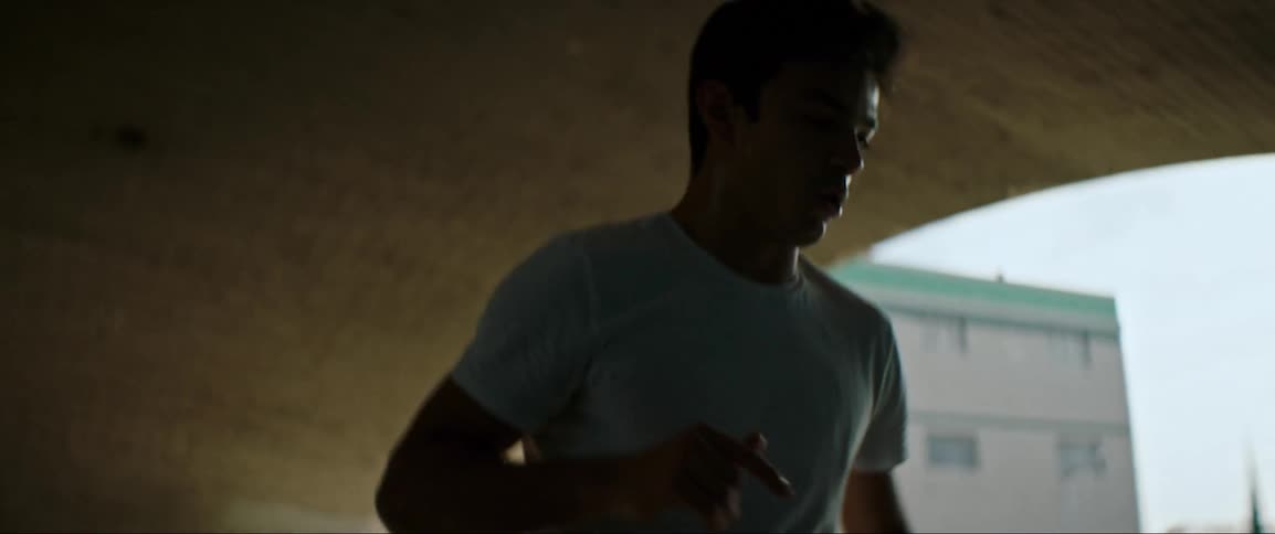 A person jumps back and forth under the tunnel