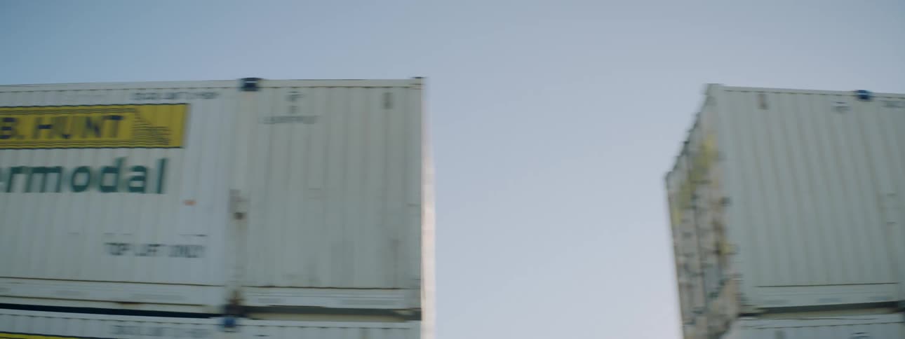 Metal shipping containers on a clear bright day