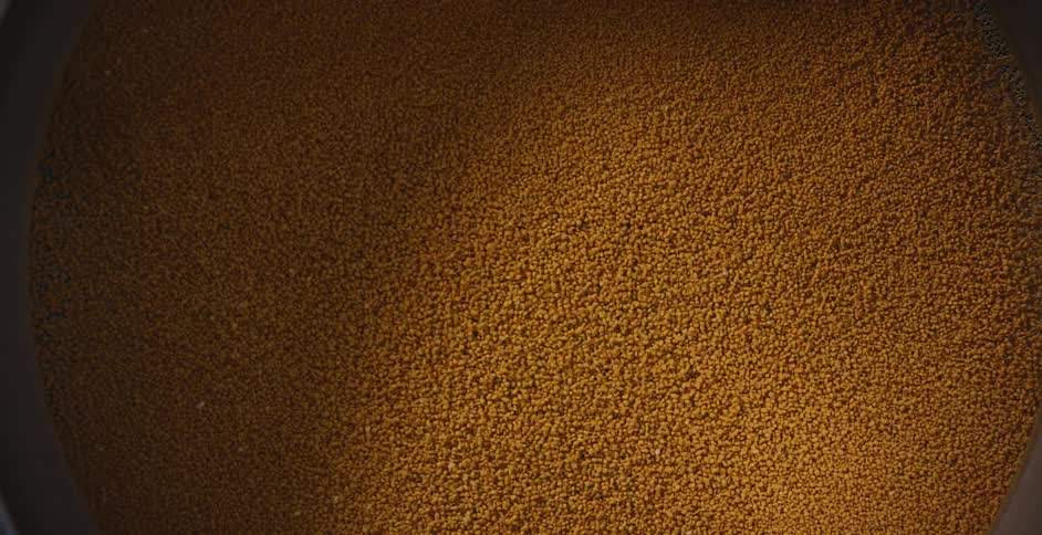 A grain in a funnel in a factory