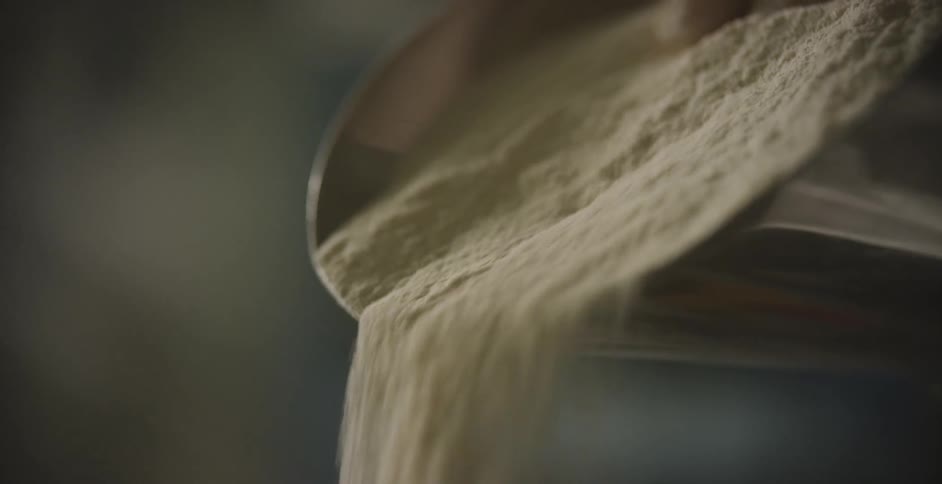 Sand falling from a shovel