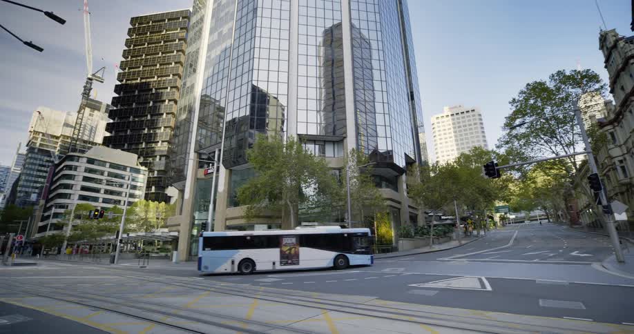 A bus turns the corner in the intersection