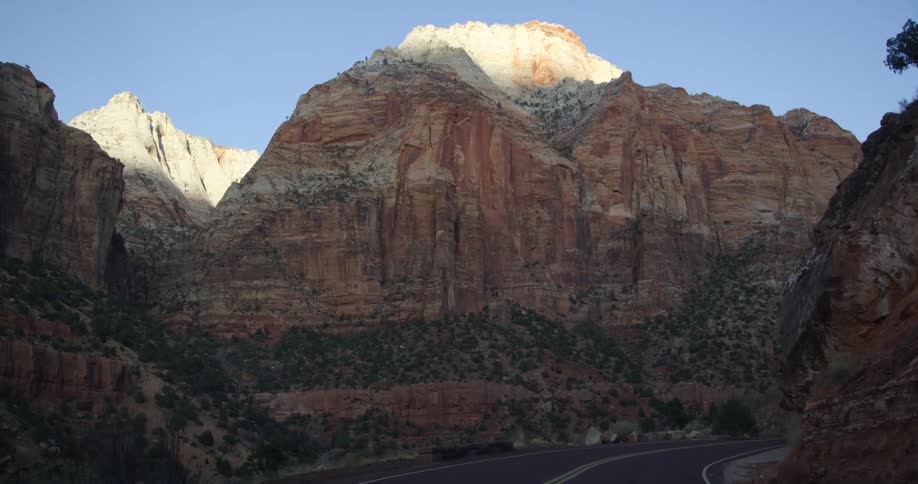 Massive rock formations and deep canyons