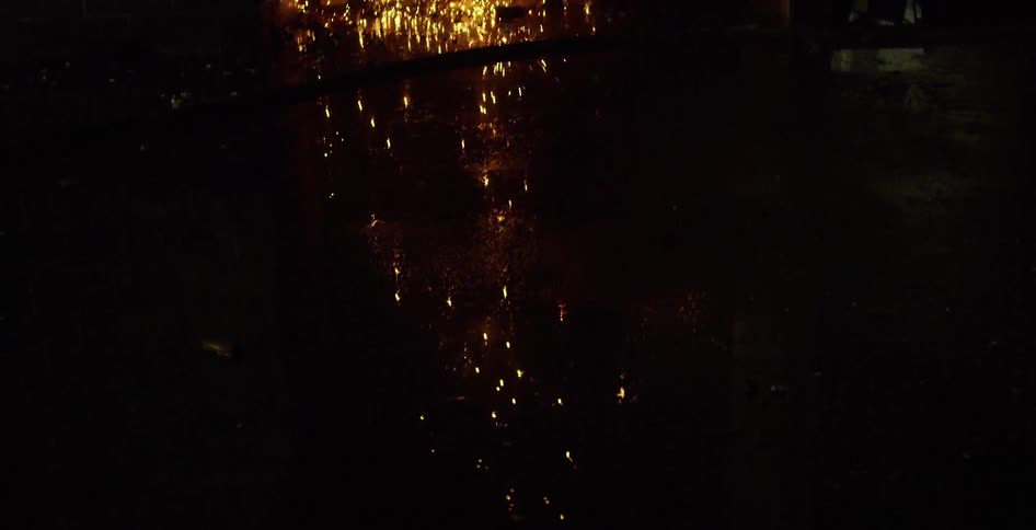Fireworks explode and land in a river