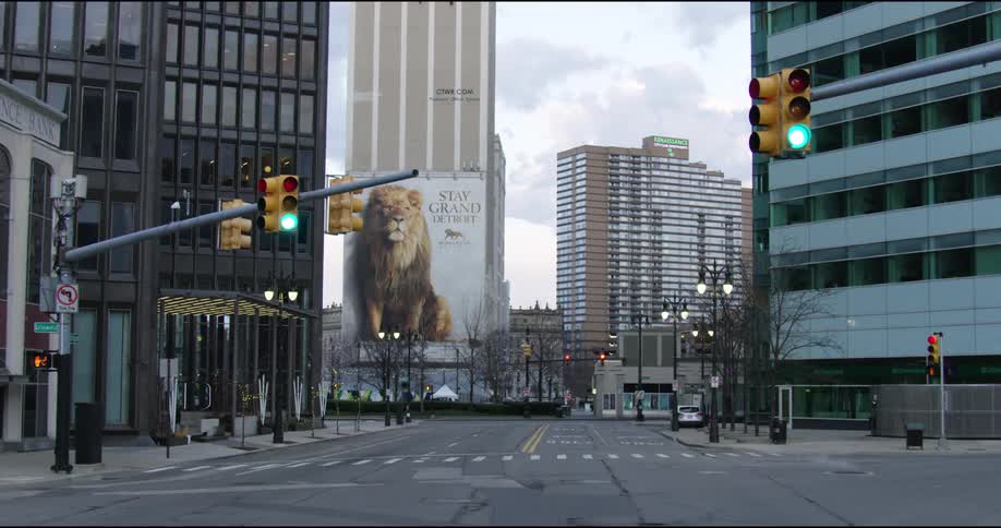 Traffic lights changing on empty street intersection on downtown chicago at day