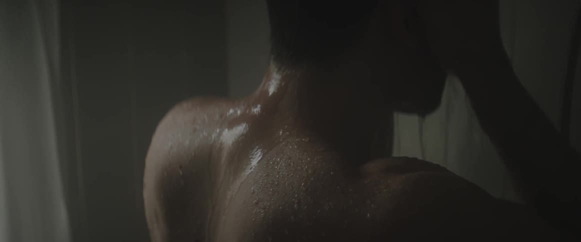 A man takes a shower