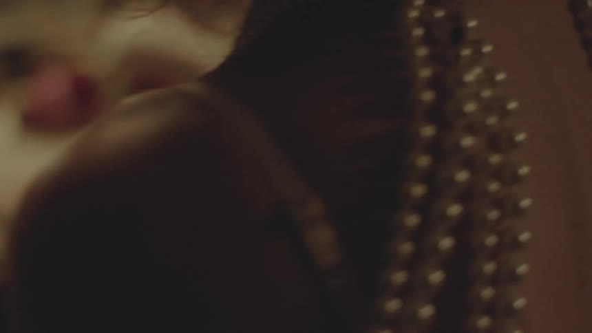 Close up of pearls on a woman