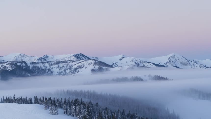 Aerial view of the snow capped mountain range