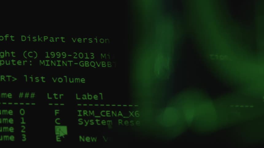 A computer screen with green text