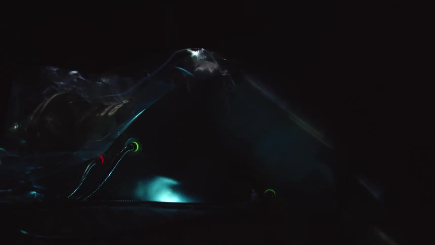 Futuristic machinery blinks and flashes