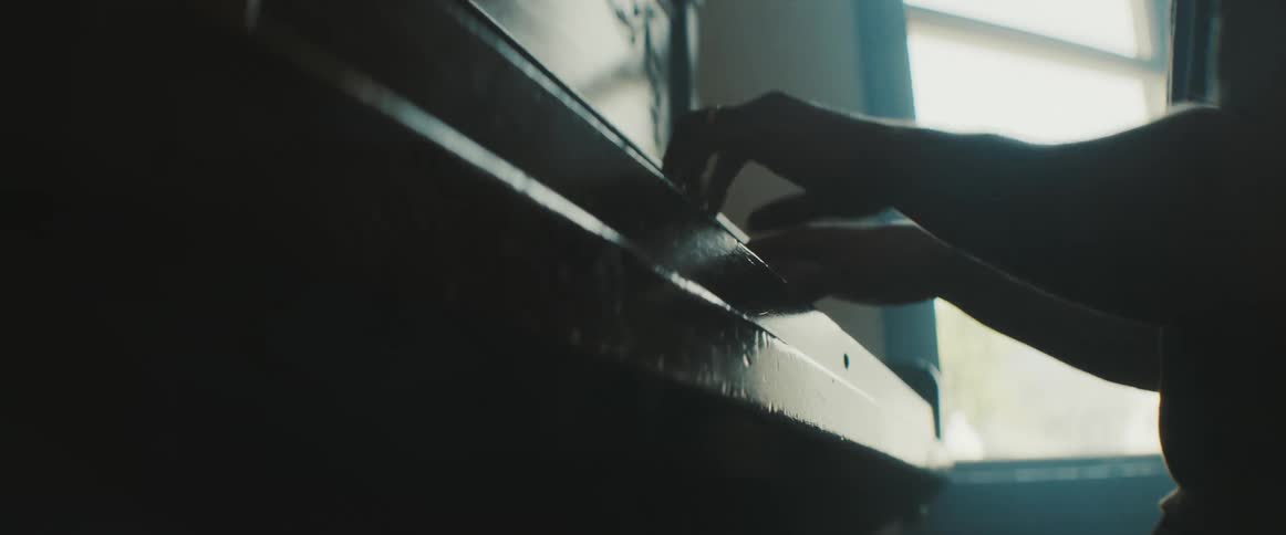A man plays the piano