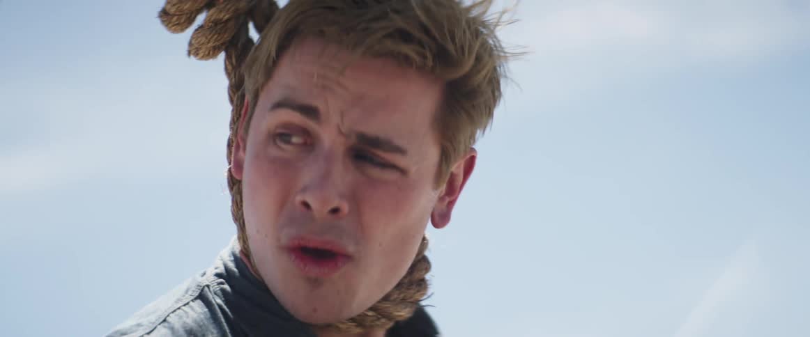 The man has a noose around his neck as he looks back