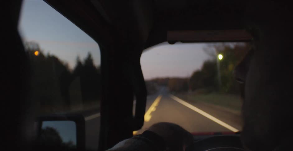 A man drives in his car