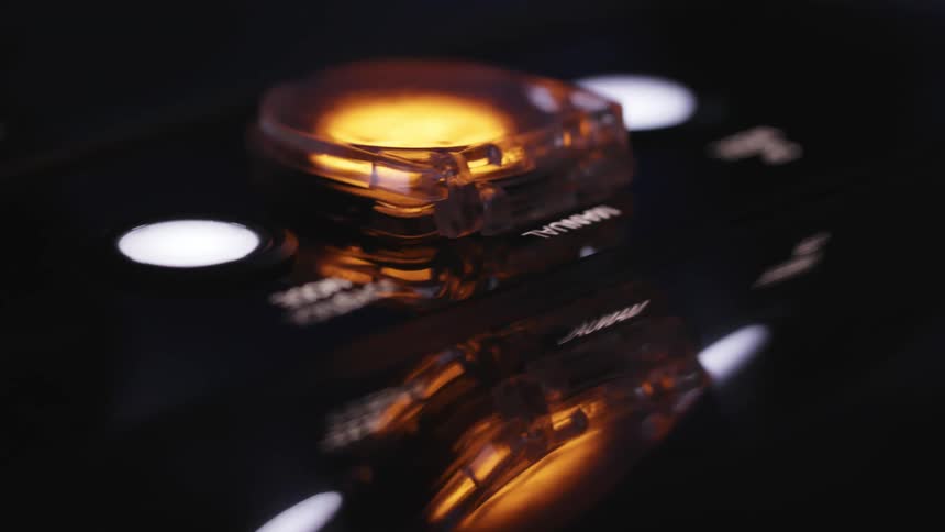 A control panel with buttons and lights