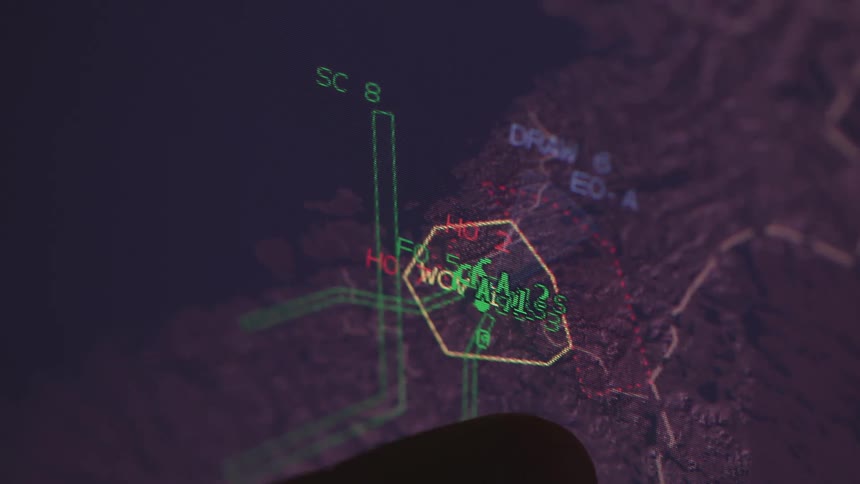 A person is pointing at locations on a map