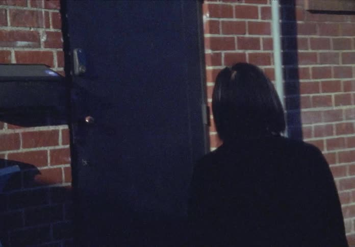 Woman walks in the parking lot