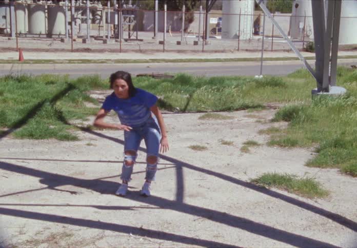 Woman dances in the field