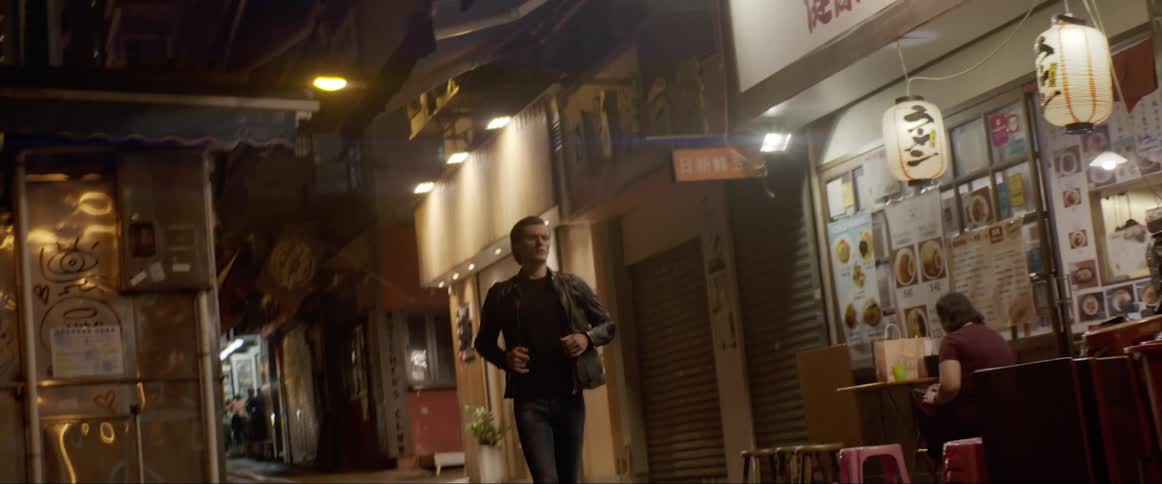 Man runs in the alley at night