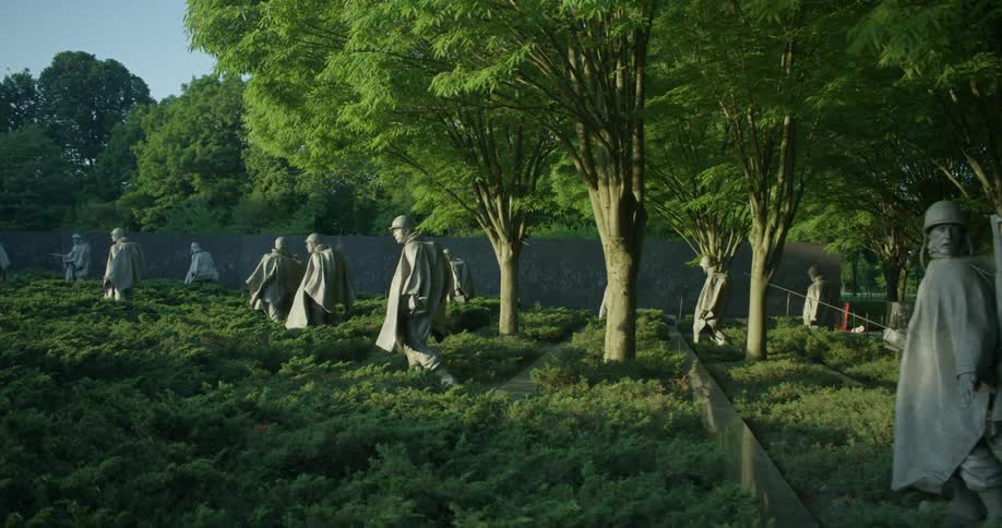 Statues of soldiers in a garden