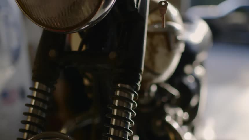 Close up of a motorcycle standing in a garage